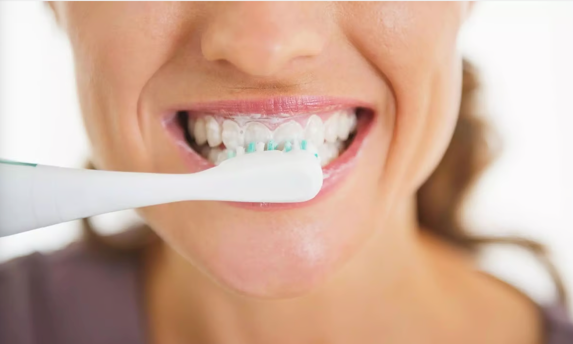 Use an Electric Toothbrush on Permanent Crowns