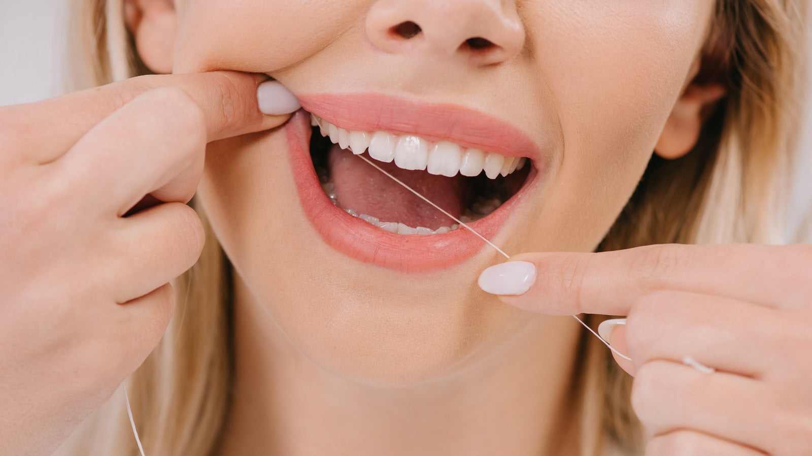 Why Do My Gums Hurt When I Floss? Causes, Tips & Solutions